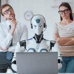 STK business people supervising a robot 594