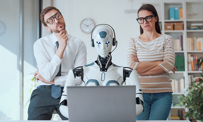 STK business people supervising a robot 594